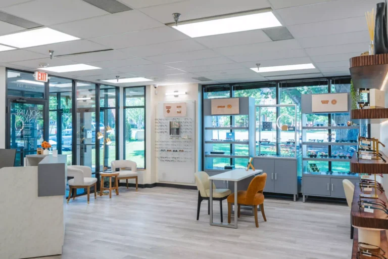 Bright waiting area with window seating at Solaire Vision in Oakton, VA